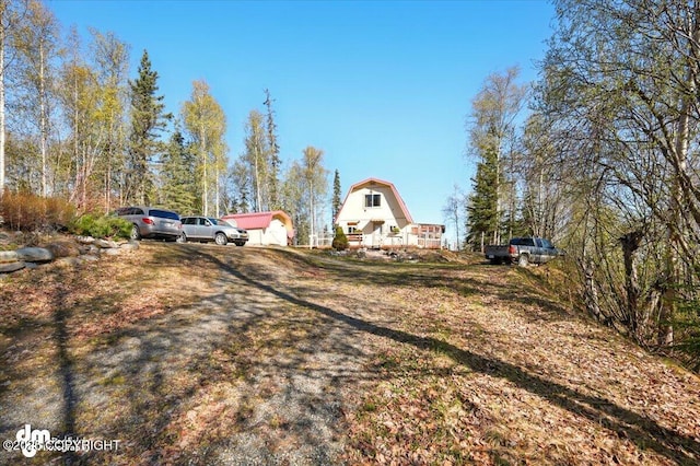 8266 S Big Lake Rd, Big Lake, AK 99652 - view of front facade featuring a gambrel roof