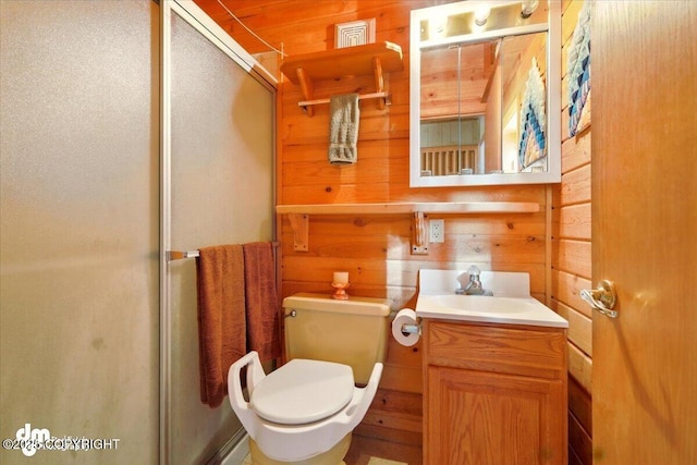 8266 S Big Lake Rd, Big Lake, AK 99652 - full bath featuring a shower stall, wood walls, vanity, and toilet