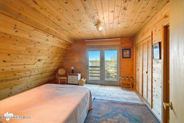 8266 S Big Lake Rd, Big Lake, AK 99652 - bedroom with wooden ceiling, access to outside, wood walls, and french doors