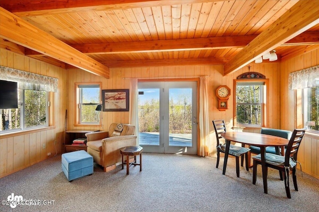 8266 S Big Lake Rd, Big Lake, AK 99652 - living area featuring beam ceiling, wooden walls, carpet flooring, and wood ceiling