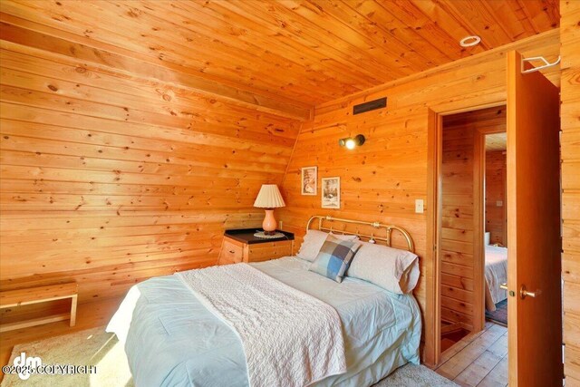 8266 S Big Lake Rd, Big Lake, AK 99652 - bedroom with wooden ceiling, wood-type flooring, and wood walls