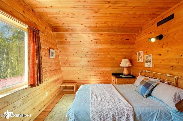 8266 S Big Lake Rd, Big Lake, AK 99652 - bedroom featuring wood walls, wooden ceiling, and wood finished floors