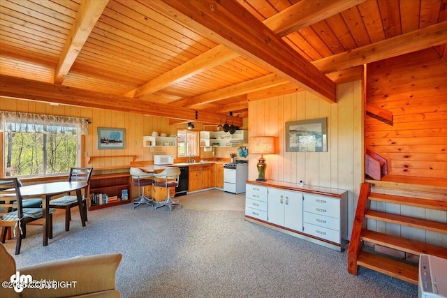 8266 S Big Lake Rd, Big Lake, AK 99652 - office with beamed ceiling, wood walls, carpet flooring, wooden ceiling, and a sink