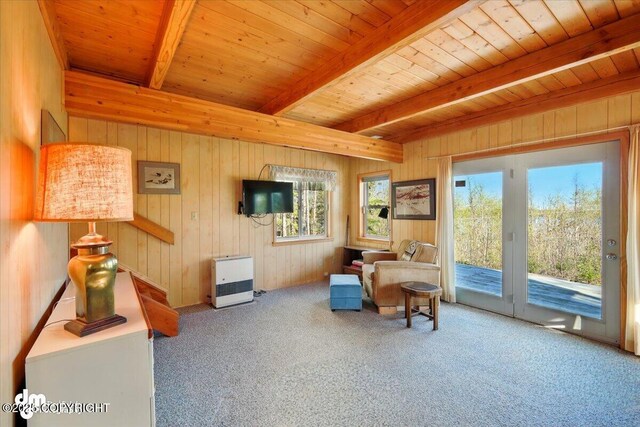 8266 S Big Lake Rd, Big Lake, AK 99652 - sitting room featuring beam ceiling, carpet flooring, wooden ceiling, and wooden walls