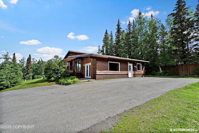 6700 Omalley Rd, Anchorage, AK 99507 - rustic home with asphalt driveway