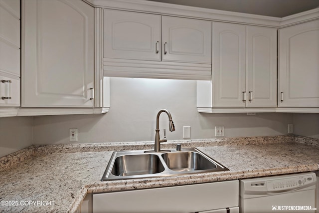 6700 Omalley Rd, Anchorage, AK 99507 - kitchen featuring white dishwasher, a sink, white cabinets, and light countertops