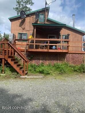 35290 Fisherman Rd, Soldotna, AK 99669 - rear view of property with stairway and a wooden deck
