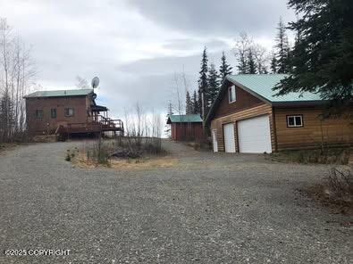 35290 Fisherman Rd, Soldotna, AK 99669 - exterior space featuring driveway, a garage, and an outbuilding