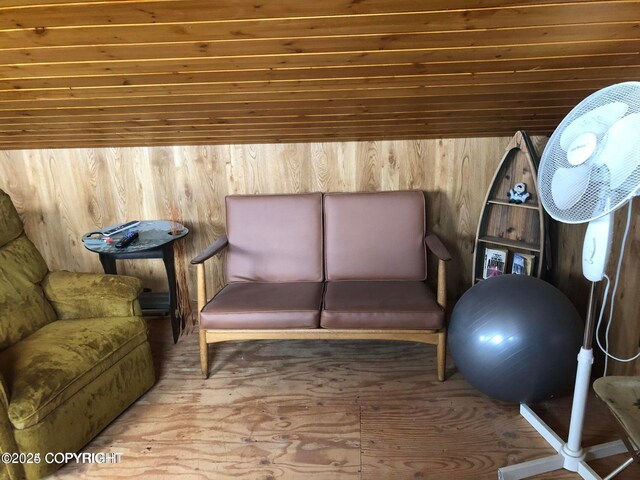 35290 Fisherman Rd, Soldotna, AK 99669 - sitting room with hardwood / wood-style flooring and wooden walls