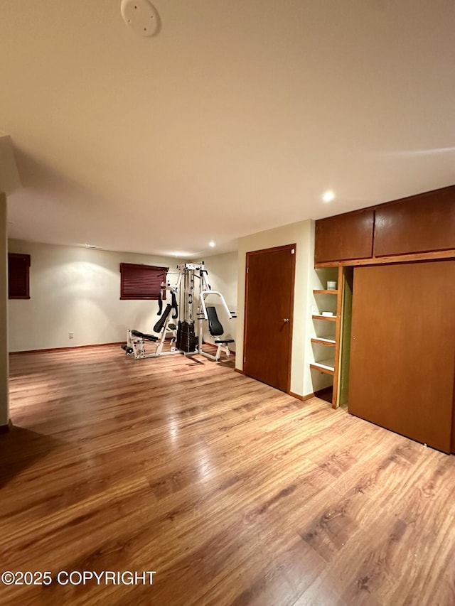 33434 Nash Rd, Seward, AK 99664 - exercise area featuring baseboards, recessed lighting, and wood finished floors