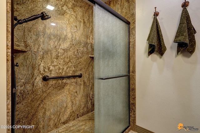 full bathroom with a shower stall