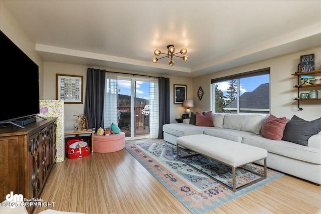 8000 Cox Dr, Anchorage, AK 99516 - living room with a chandelier and wood finished floors