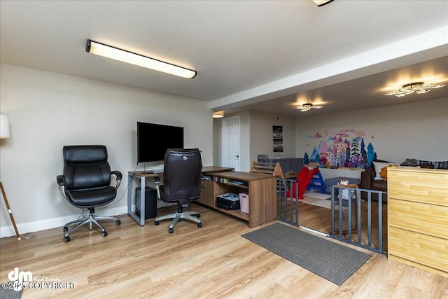 8000 Cox Dr, Anchorage, AK 99516 - office area featuring wood finished floors and baseboards