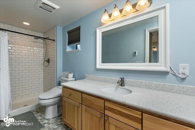 8000 Cox Dr, Anchorage, AK 99516 - full bathroom with toilet, visible vents, a shower stall, and vanity