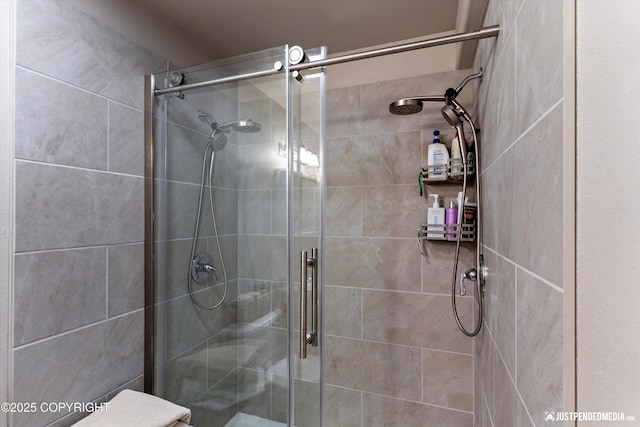 bathroom with a stall shower