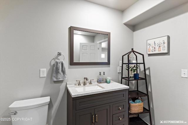 half bath with toilet and vanity