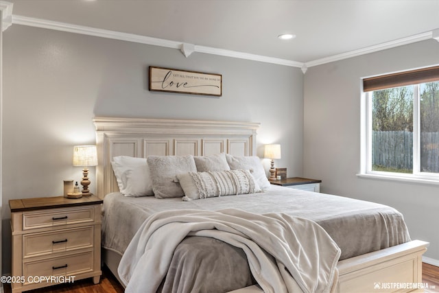 bedroom featuring crown molding, recessed lighting, and dark wood-style flooring