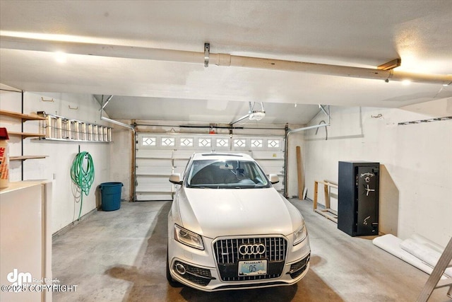 12100 Woodway Cir, Anchorage, AK 99516 - garage featuring a garage door opener