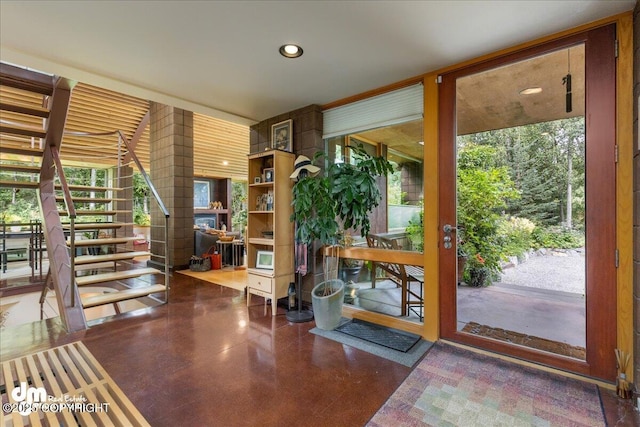 entryway featuring recessed lighting and a wealth of natural light