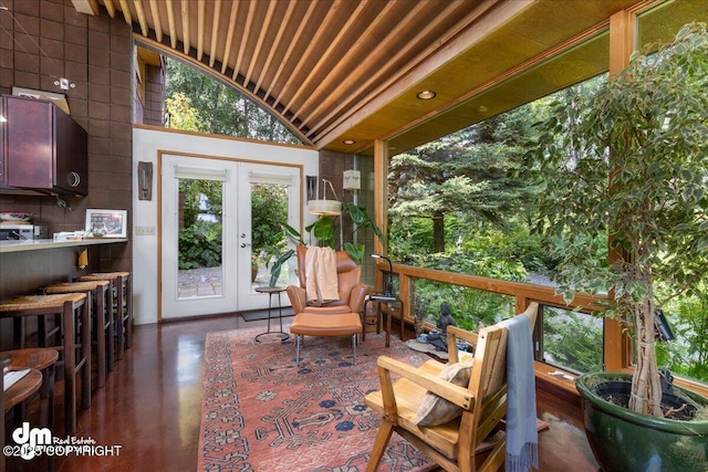 sunroom featuring french doors