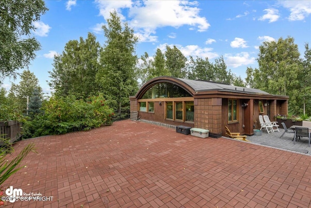 view of patio featuring fence