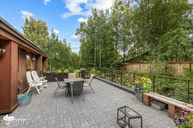 view of patio / terrace with fence and outdoor dining area