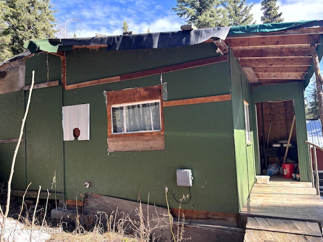 view of property exterior with stucco siding