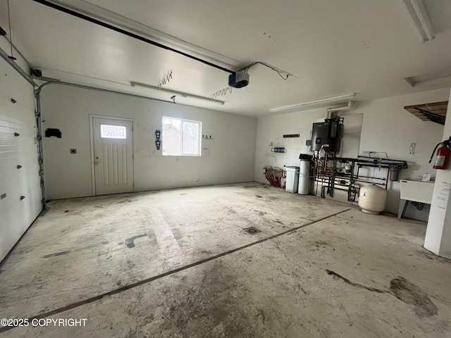 49045 Gemini Ct, Soldotna, AK 99669 - garage with a garage door opener