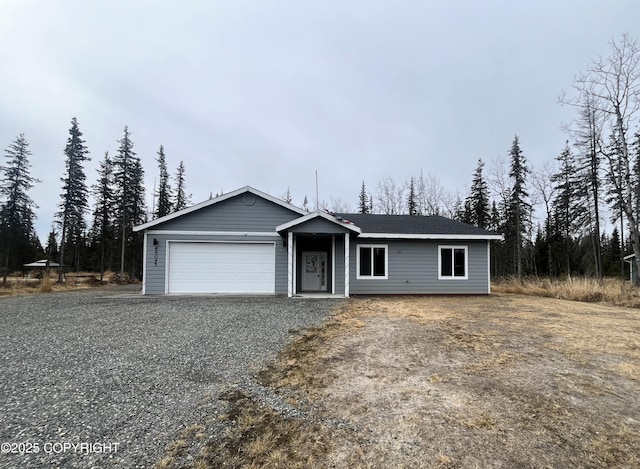 49045 Gemini Ct, Soldotna, AK 99669 - ranch-style house featuring a garage and gravel driveway