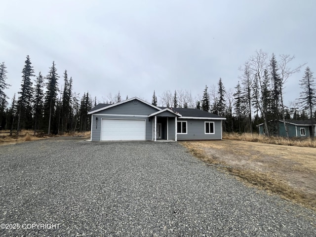 49045 Gemini Ct, Soldotna, AK 99669 - ranch-style home with a garage and driveway
