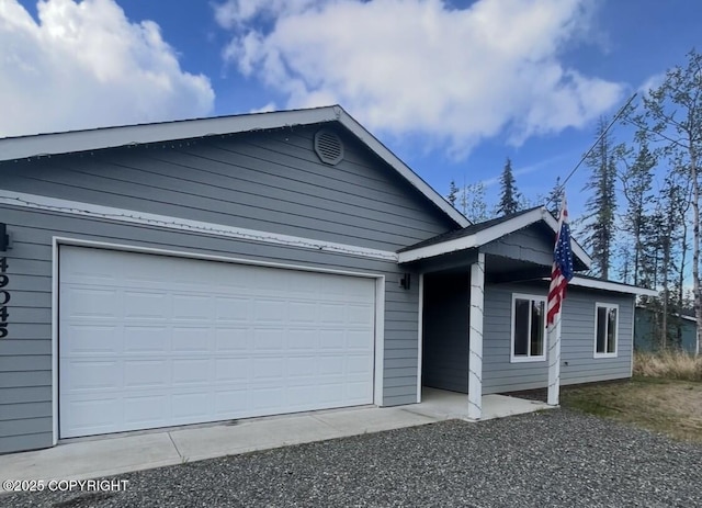 49045 Gemini Ct, Soldotna, AK 99669 - ranch-style house featuring an attached garage