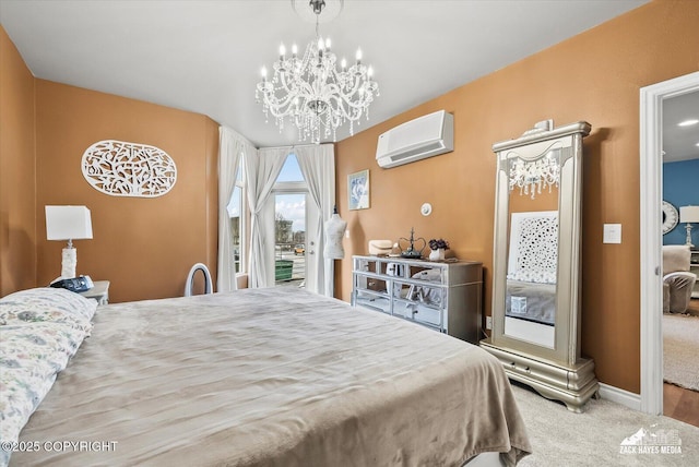 222 E 7th Ave # 106, Anchorage, AK 99501 - carpeted bedroom featuring an inviting chandelier, baseboards, access to outside, and a wall mounted air conditioner