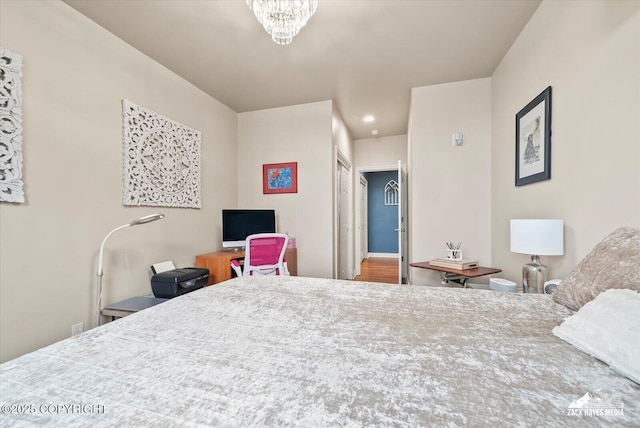222 E 7th Ave # 106, Anchorage, AK 99501 - bedroom featuring a chandelier