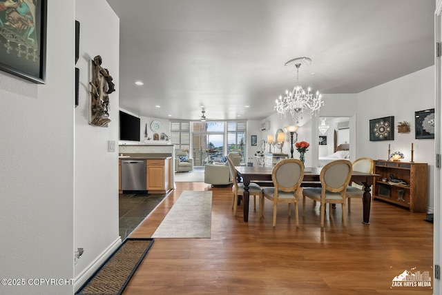 222 E 7th Ave # 106, Anchorage, AK 99501 - dining room featuring dark wood-style flooring, recessed lighting, a chandelier, a ceiling fan, and a wall mounted AC