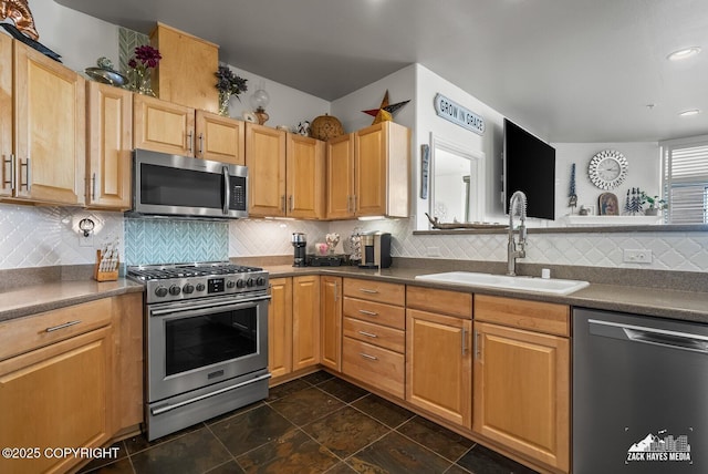 222 E 7th Ave # 106, Anchorage, AK 99501 - kitchen featuring stainless steel appliances, backsplash, dark countertops, recessed lighting, and light brown cabinets