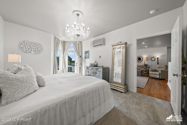 222 E 7th Ave # 106, Anchorage, AK 99501 - bedroom with a wall mounted air conditioner, a chandelier, carpet flooring, and access to outside