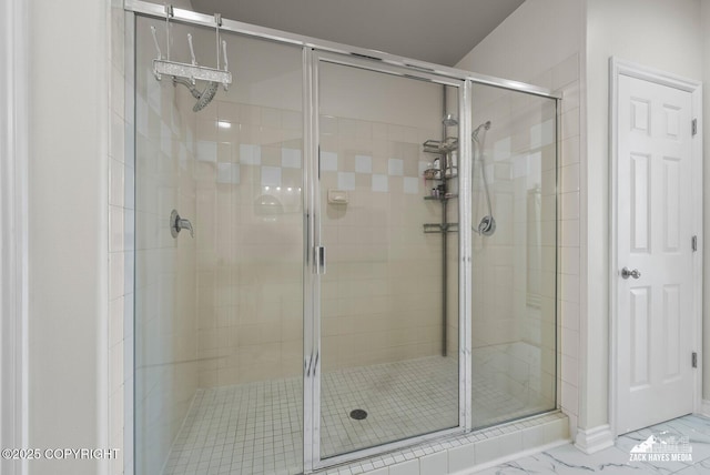222 E 7th Ave # 106, Anchorage, AK 99501 - full bath featuring a shower stall and marble look tile flooring