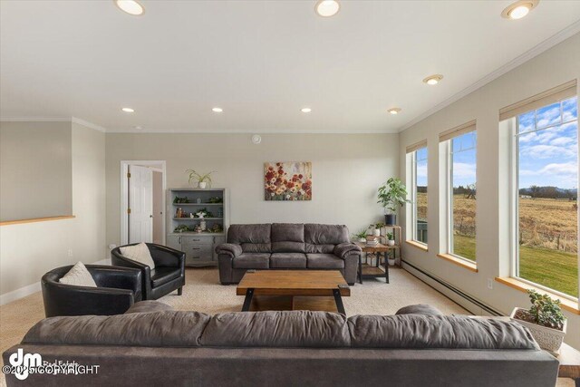 carpeted living area with baseboards, a baseboard radiator, ornamental molding, and recessed lighting