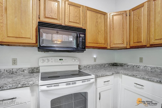 5900 E Liberty Ct, Wasilla, AK 99654 - kitchen featuring white electric stove, black microwave, and light countertops