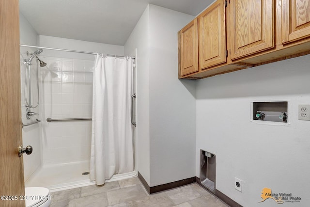 5900 E Liberty Ct, Wasilla, AK 99654 - laundry room featuring baseboards, washer hookup, and hookup for an electric dryer