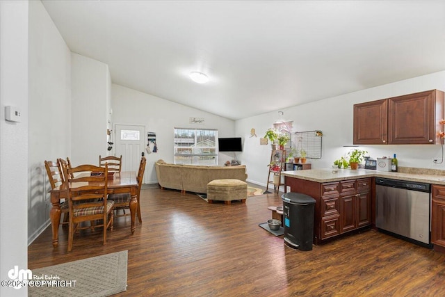 kitchen with vaulted ceiling, dishwasher, light countertops, a peninsula, and dark wood-type flooring