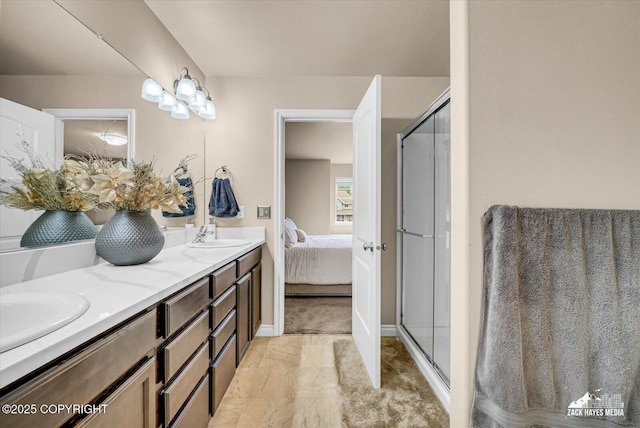 13050 Curry Ridge Cir, Eagle River, AK 99577 - ensuite bathroom with double vanity, a stall shower, and baseboards