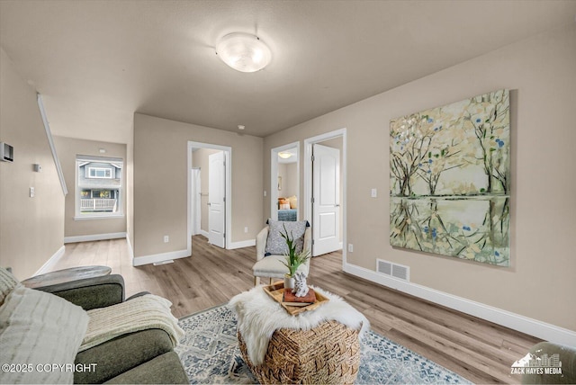 13050 Curry Ridge Cir, Eagle River, AK 99577 - living room with baseboards and wood finished floors