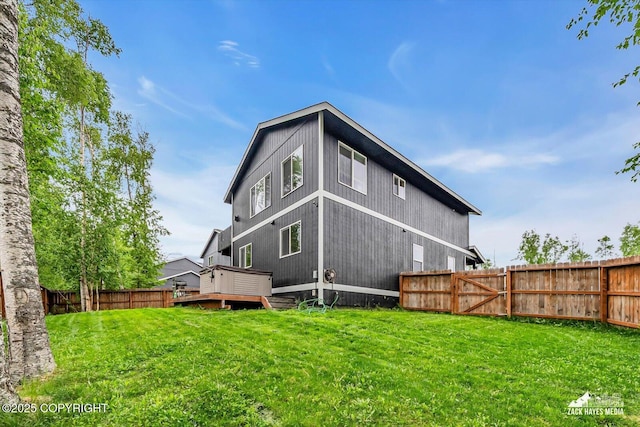 13050 Curry Ridge Cir, Eagle River, AK 99577 - back of house featuring a wooden deck