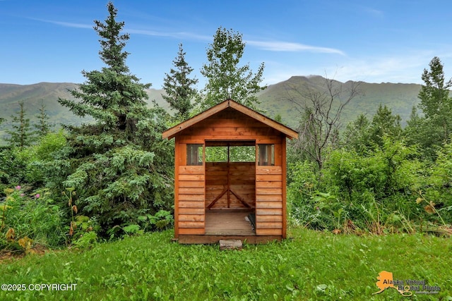 view of shed with a mountain view