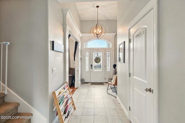 2153 S Withers Rd, Wasilla, AK 99654 - foyer featuring stairs and a chandelier
