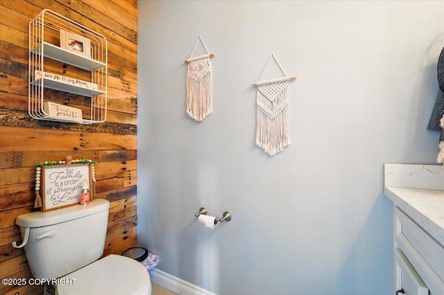 2153 S Withers Rd, Wasilla, AK 99654 - bathroom featuring wood walls and vanity
