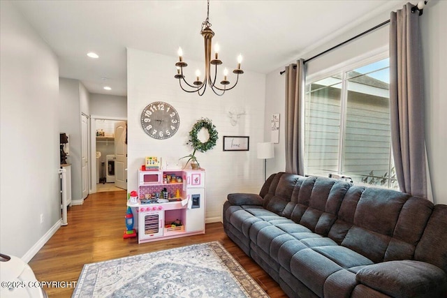 2153 S Withers Rd, Wasilla, AK 99654 - living room with a chandelier, wood finished floors, and recessed lighting