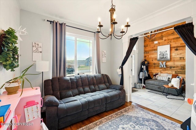 2153 S Withers Rd, Wasilla, AK 99654 - living room with a chandelier, wood walls, crown molding, and wood finished floors