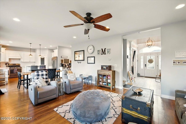 2153 S Withers Rd, Wasilla, AK 99654 - living area with a ceiling fan, wood finished floors, and recessed lighting